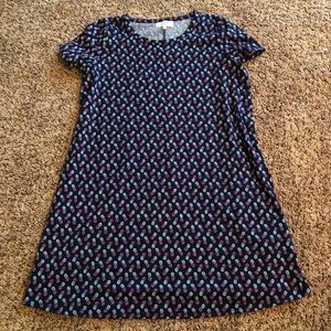 Girls crown and ivy dress with small pineapples on it